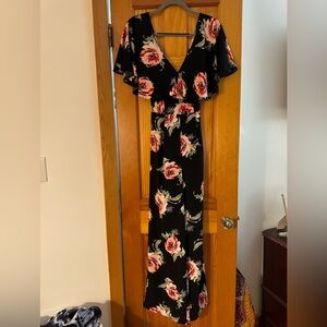 Floral romper with cross strap back - size 4